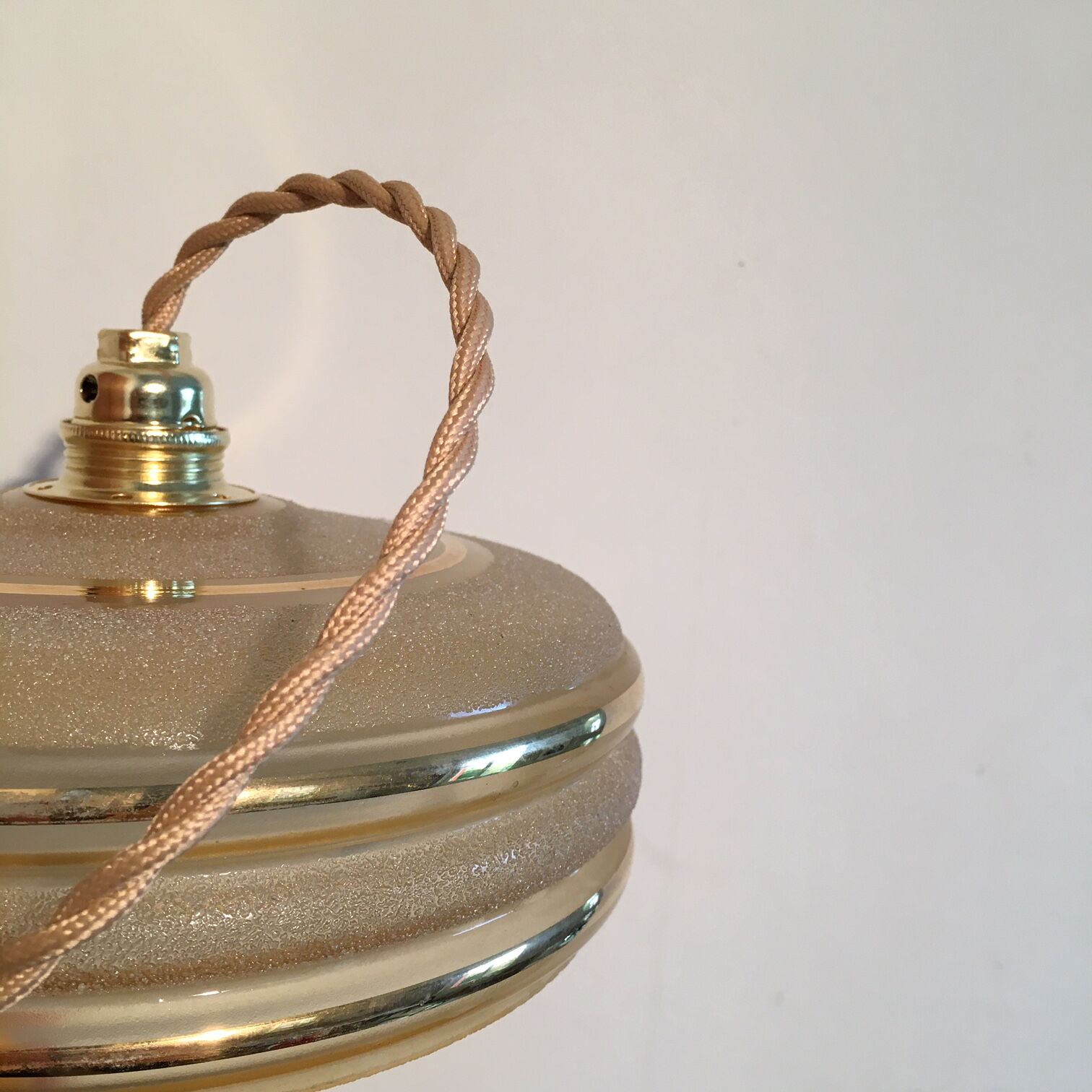 Hanging in yellow granite glass and golden edar