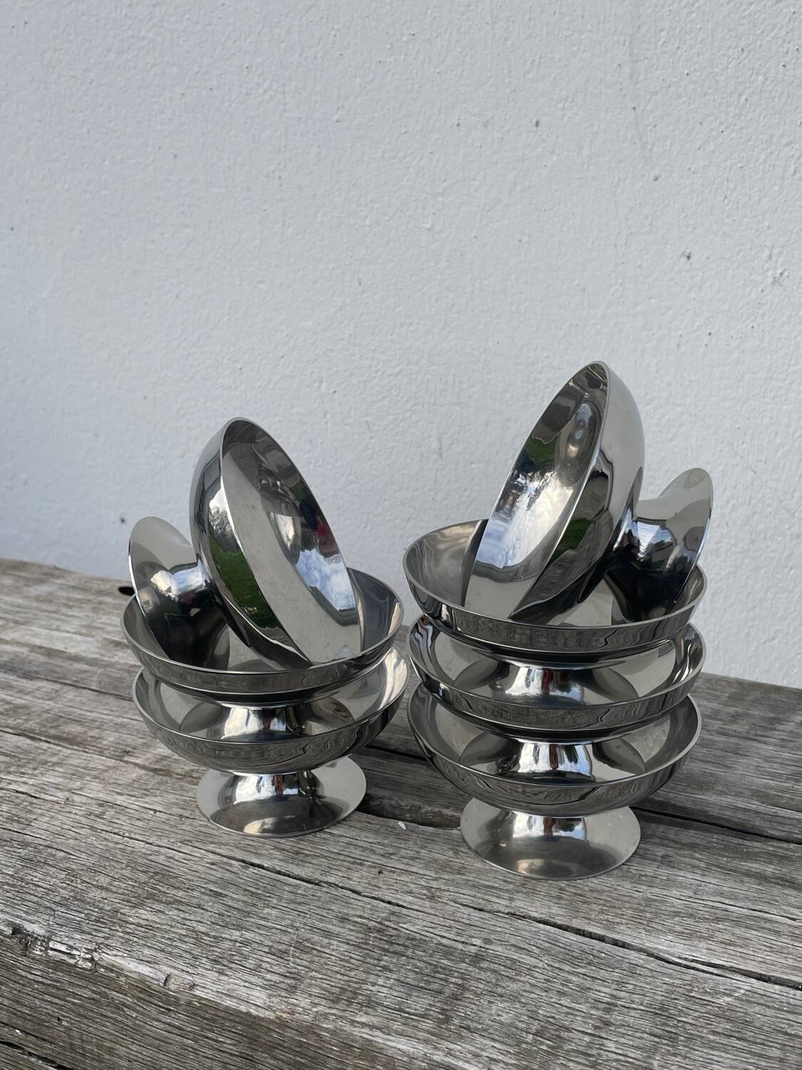 7 stainless steel cups 1970