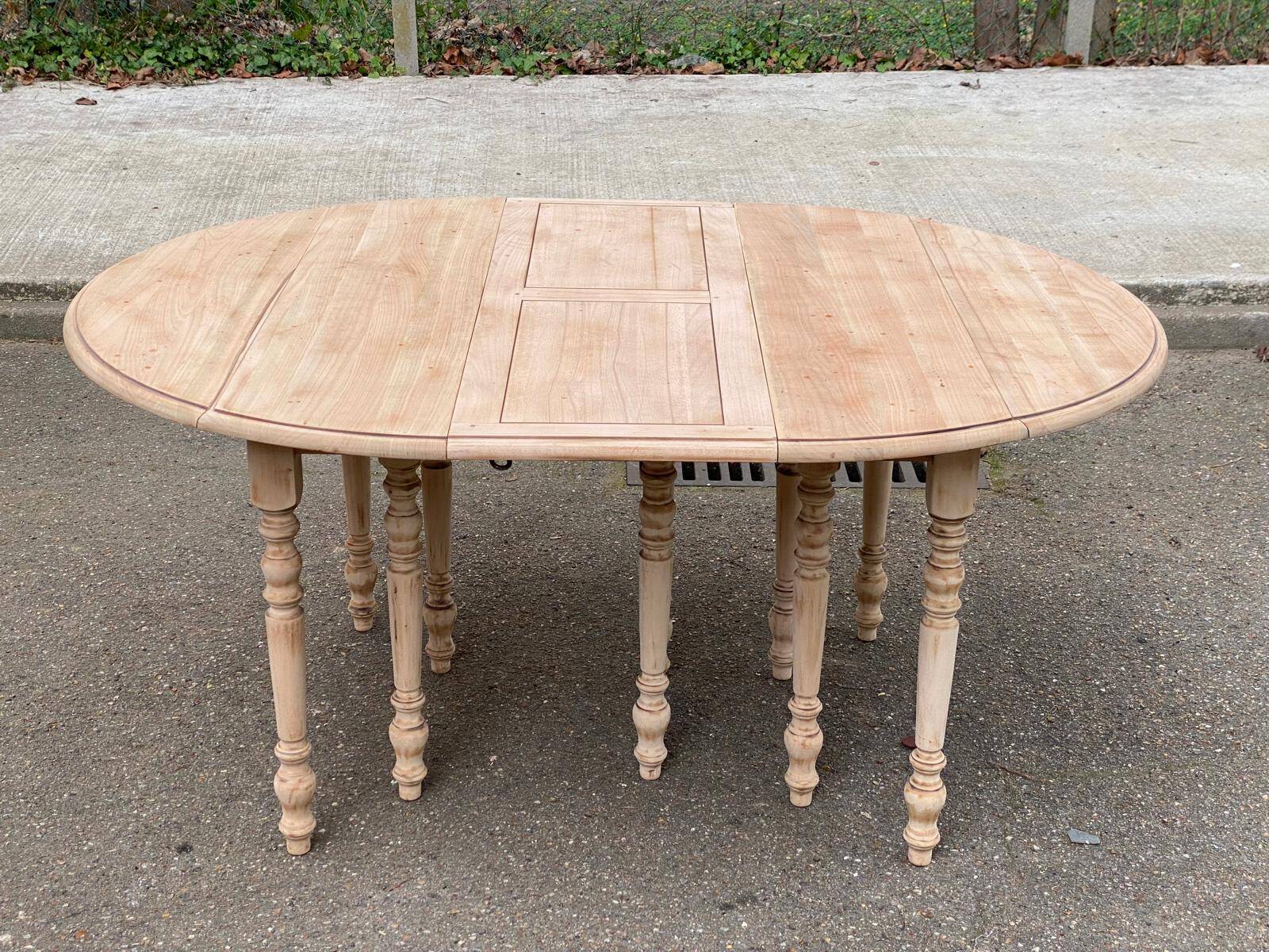 Renovated Louis Philippe extendable round banquet table with leaves, 10 feet.