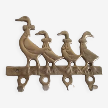 Tea towel holder or wall-mounted key holder in brass ducks