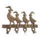 Wall-mounted tea towel holder or key holder in brass with ducks.