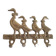 Wall-mounted tea towel holder or key holder in brass with ducks.