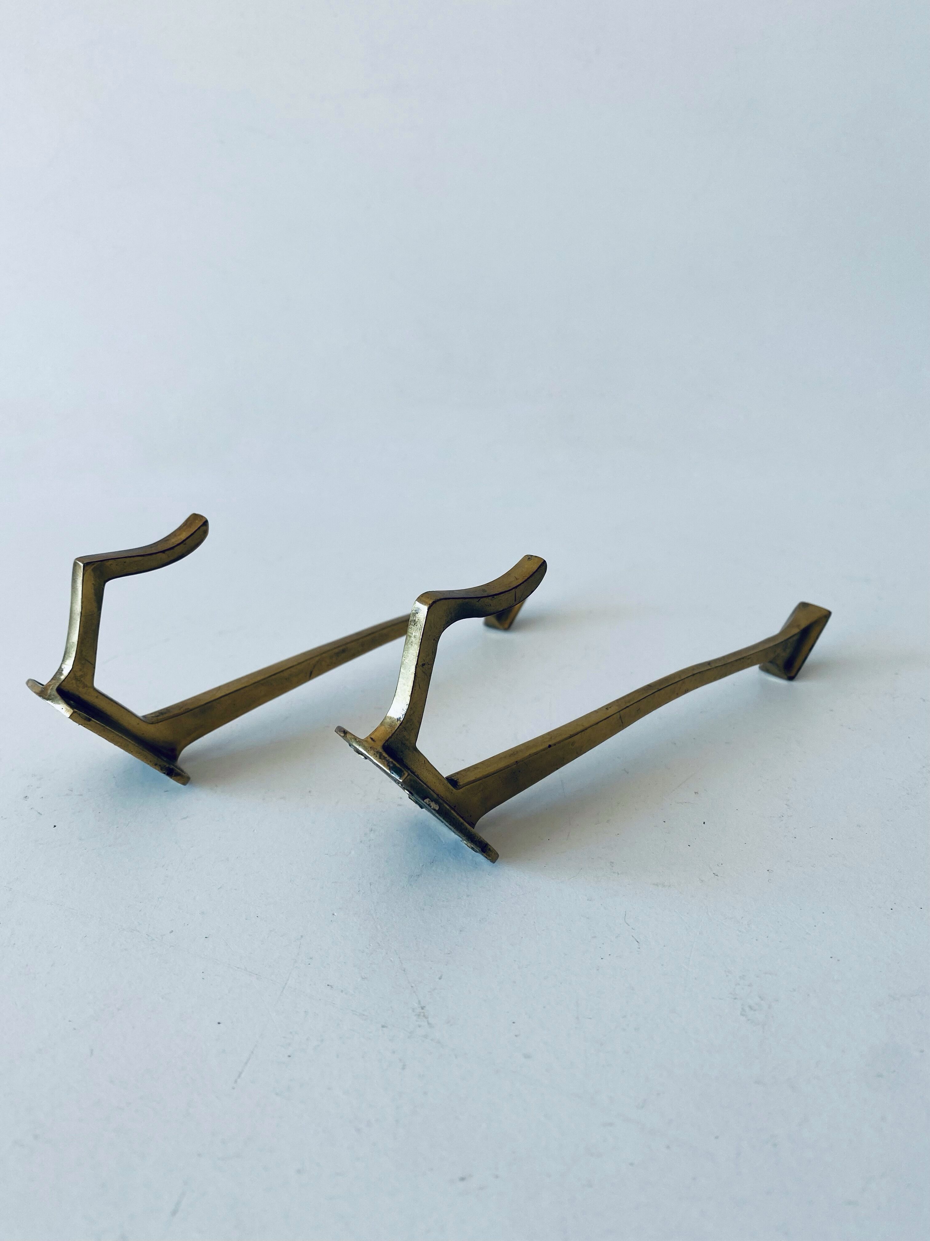 Pair of vintage brass hooks