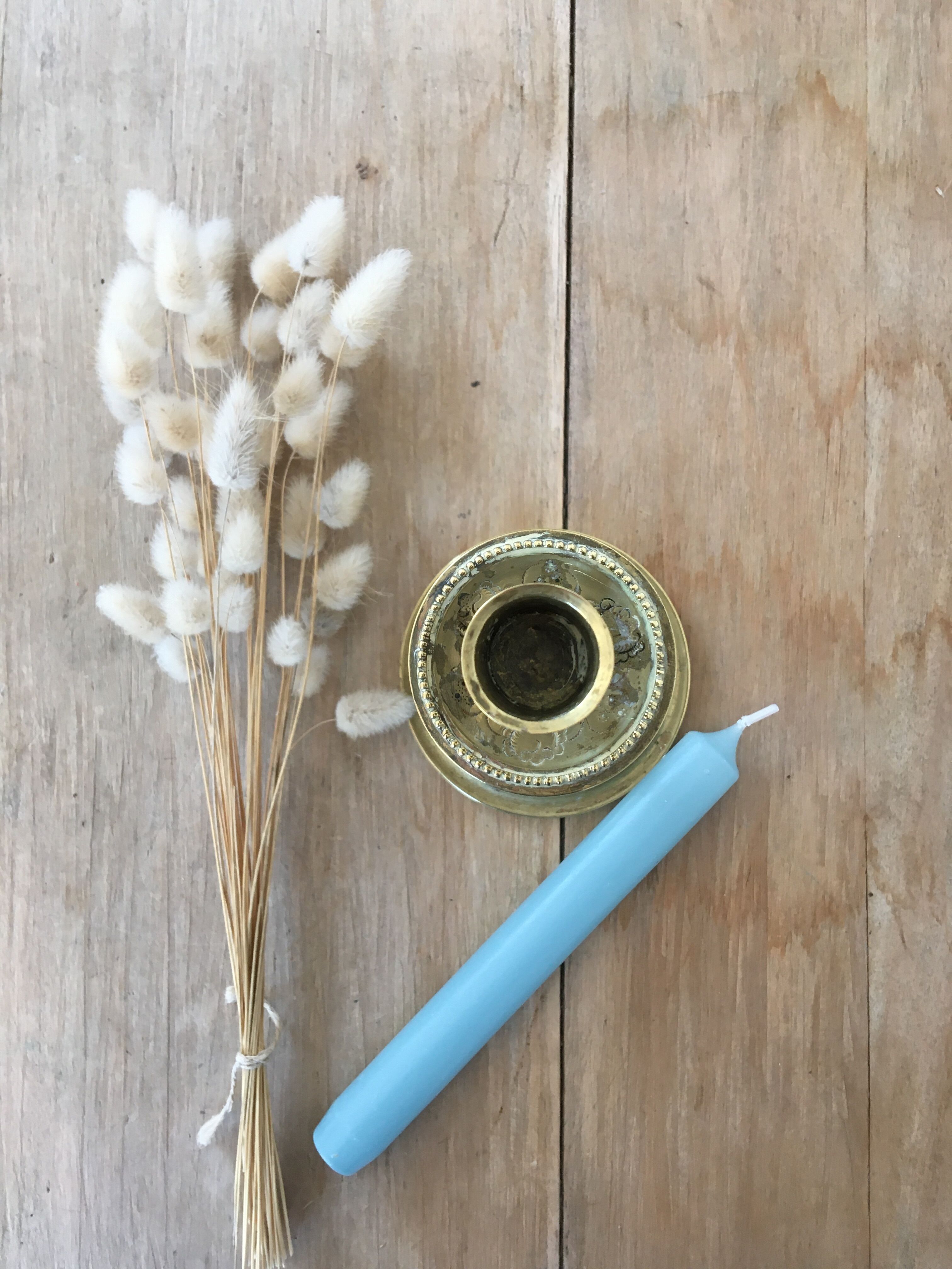 Chiseled brass candle holder