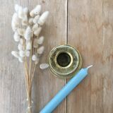 Chiseled brass candle holder