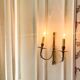Wall light in solid brass in Empire / Neoclassical style.