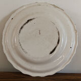 Signed Moustiers plate, in yellow shades