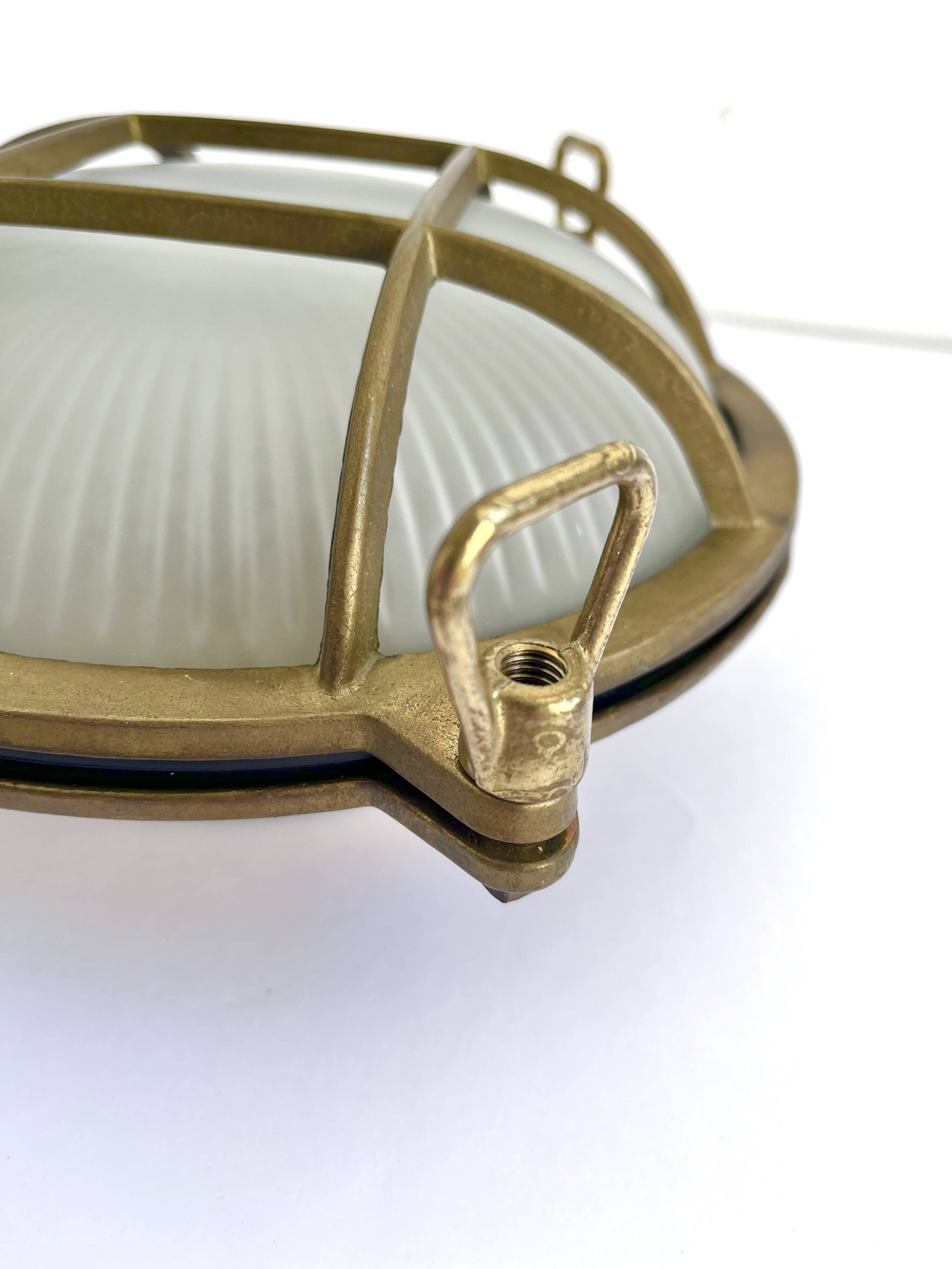 Marine decorative wall light in solid brass