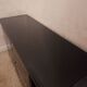Black lacquered 4-drawer cabinet by David Lange with a lacquered top.