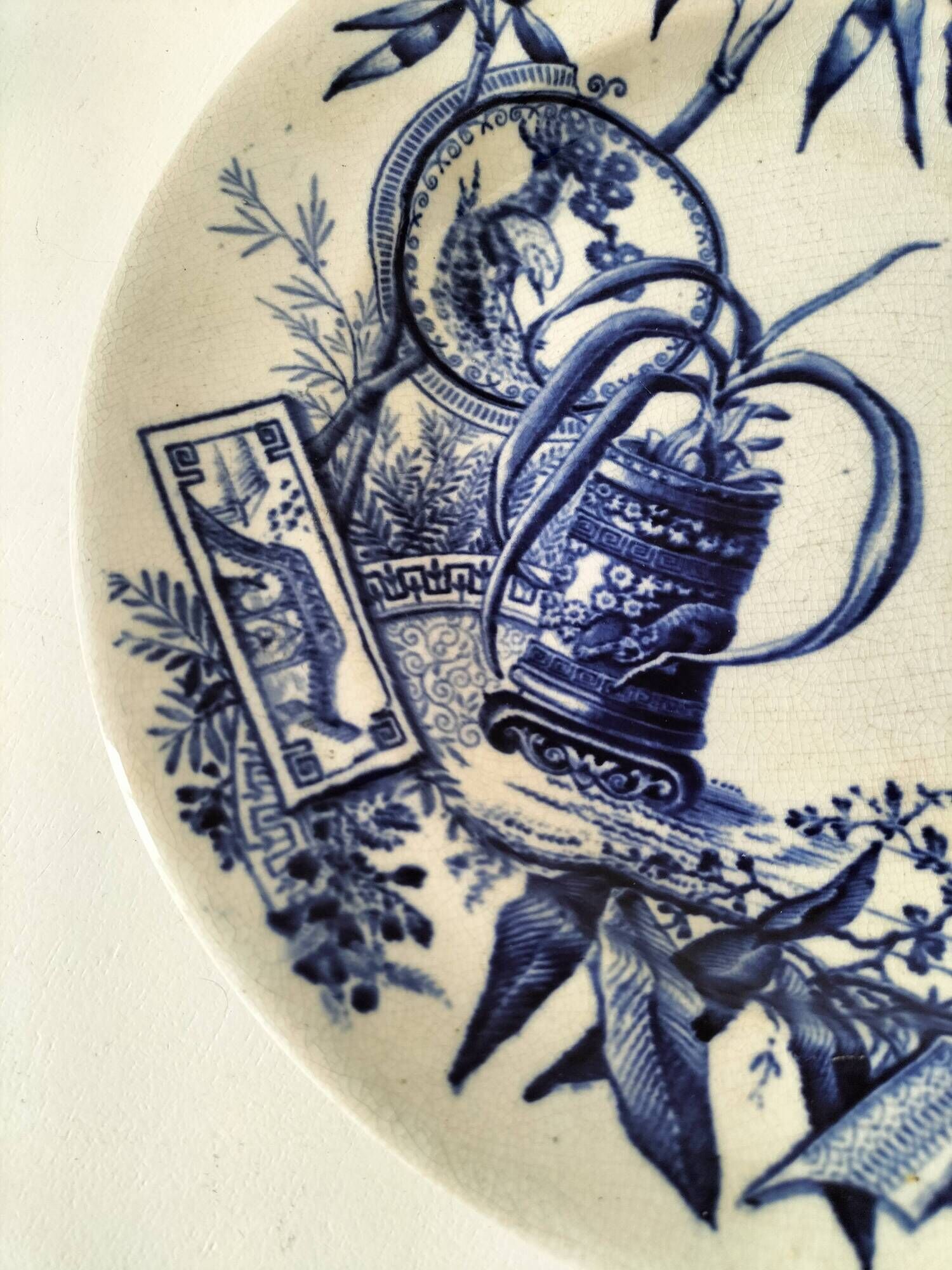 Antique plate with Chinese blue oriental decoration from the late 19th century.