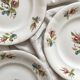 4 polychrome ironstone dessert plates with flowers, KG Lunéville