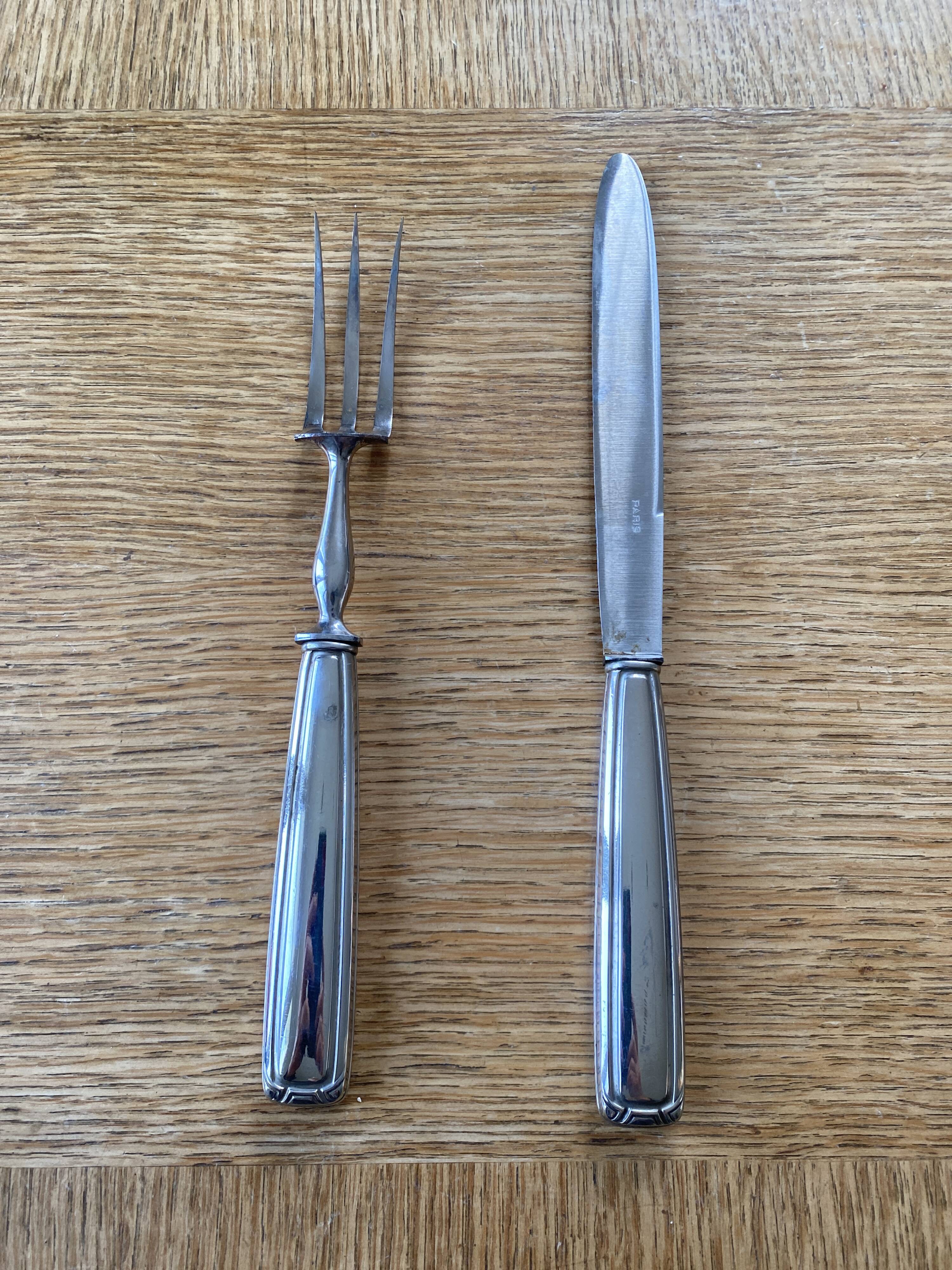 Art Deco silver metal leg of lamb cutlery