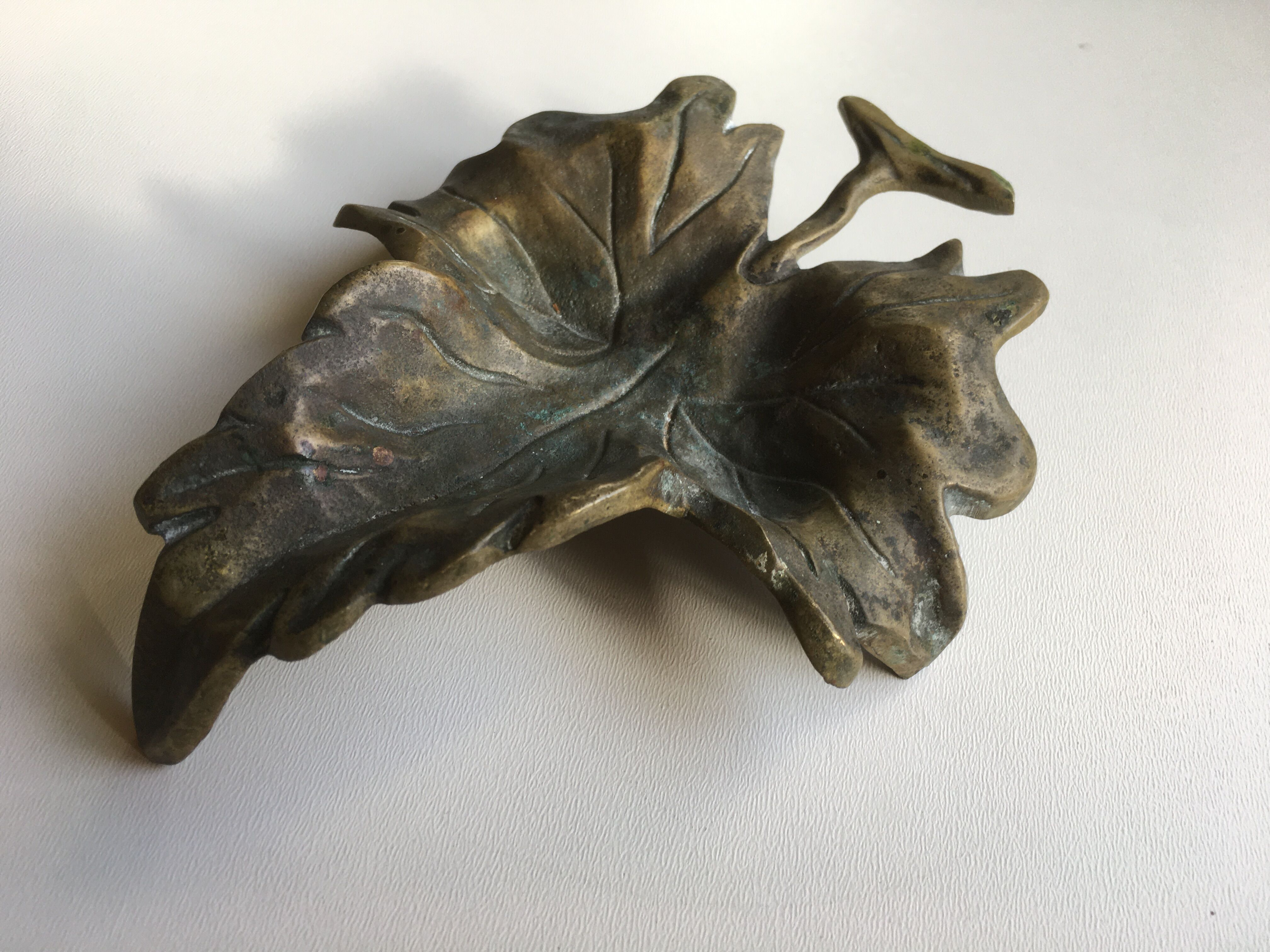 Empty pocket or ashtray leaf in old bronze