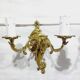 Pair of 2-light bronze wall lights, St. Louis XV