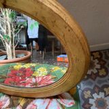 Oval mirror in gilded wood with knot, 32x37 cm