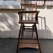 Wooden baby high chair convertible into a small desk from the 1950s