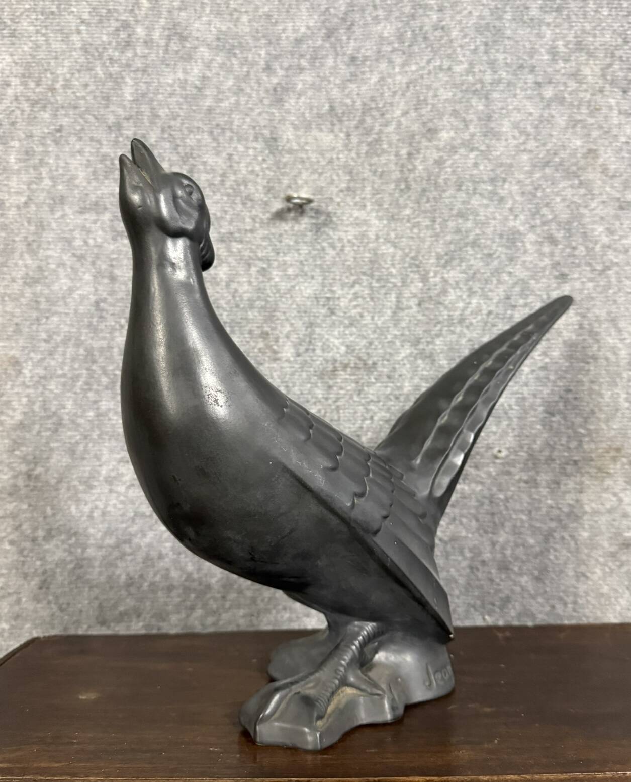 Black lacquered ceramic from the Art Deco period: bird signed Jean