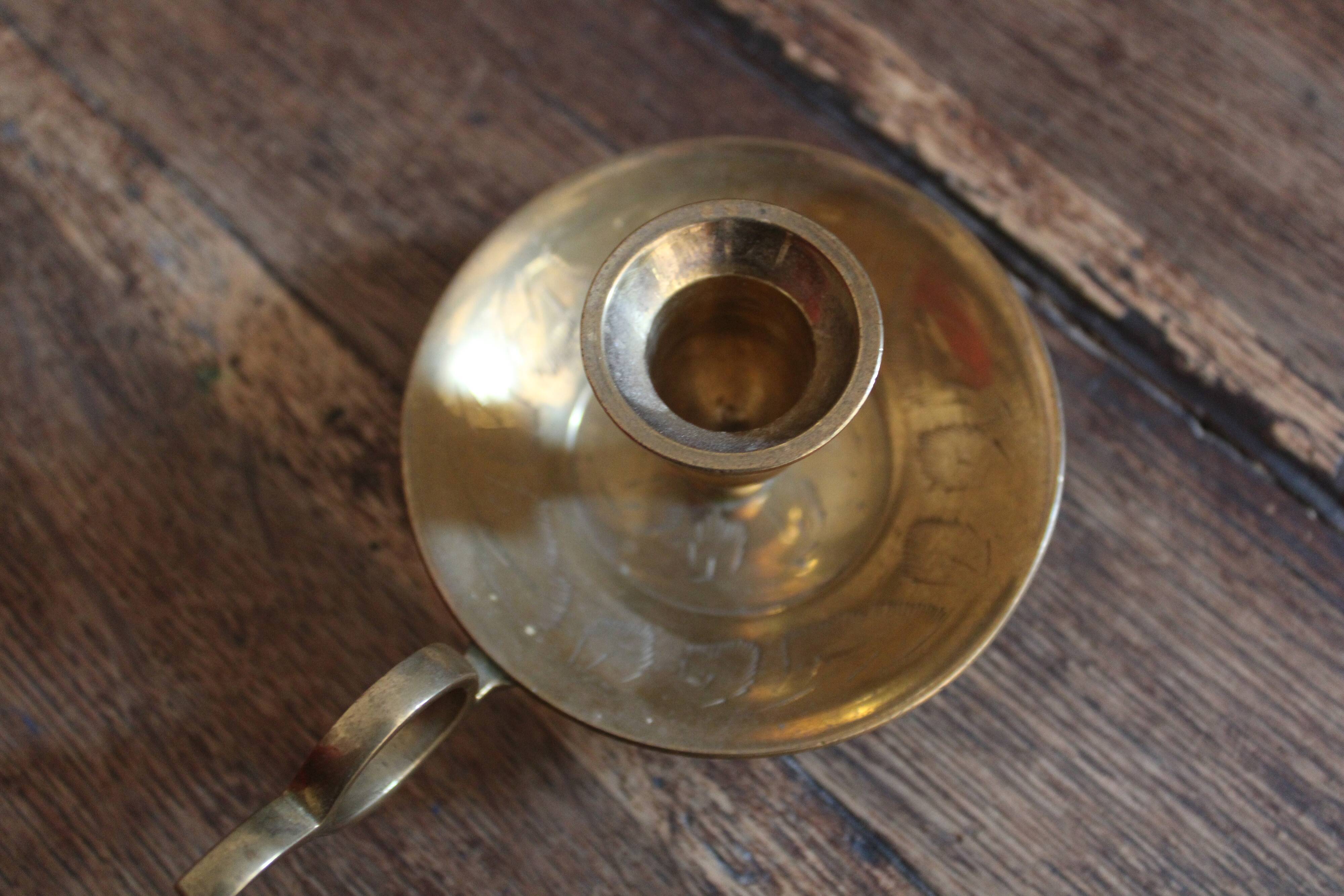 Brass cellar rat candlestick