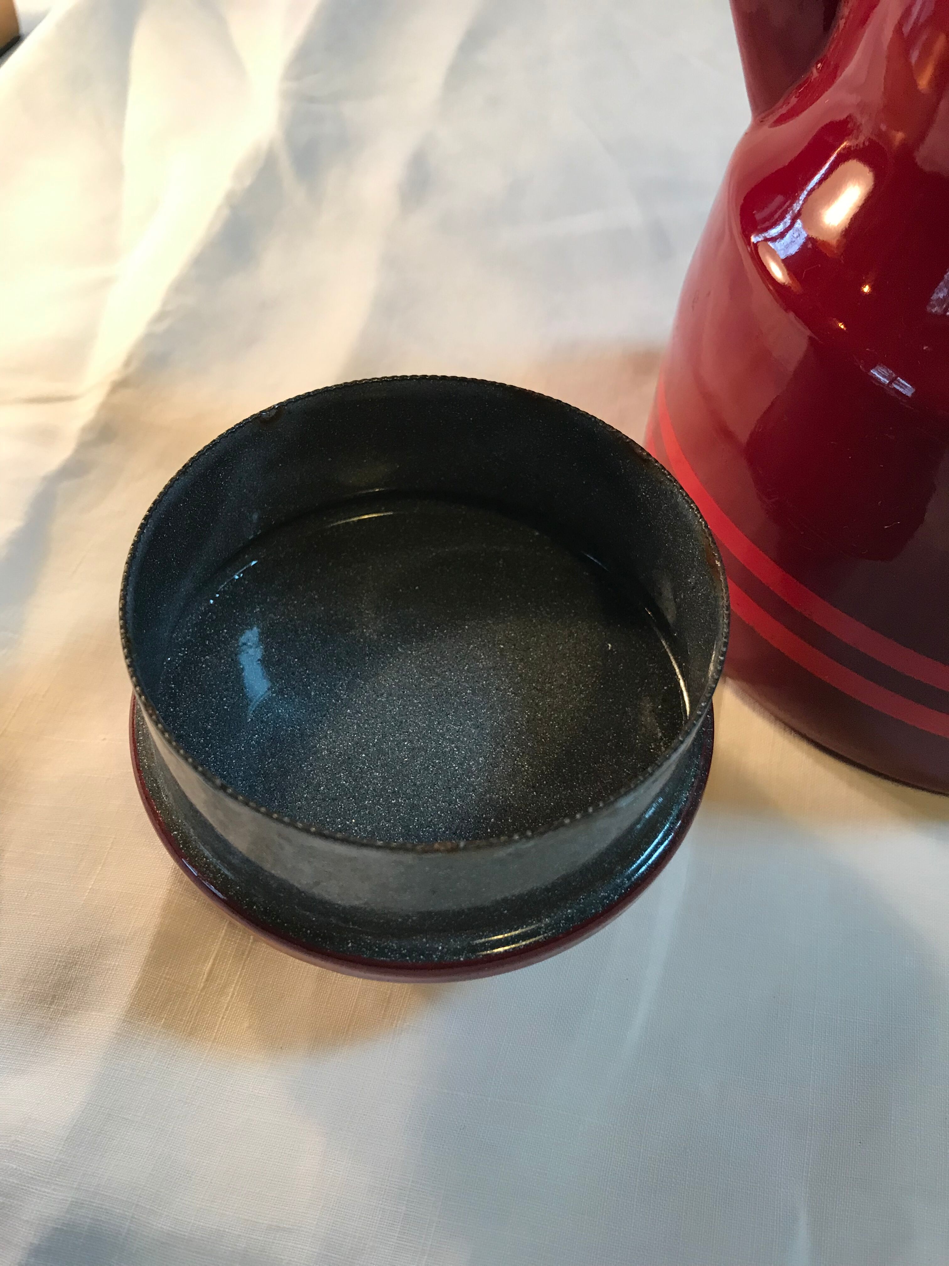 Vintage coffee maker in enamel and bakelite