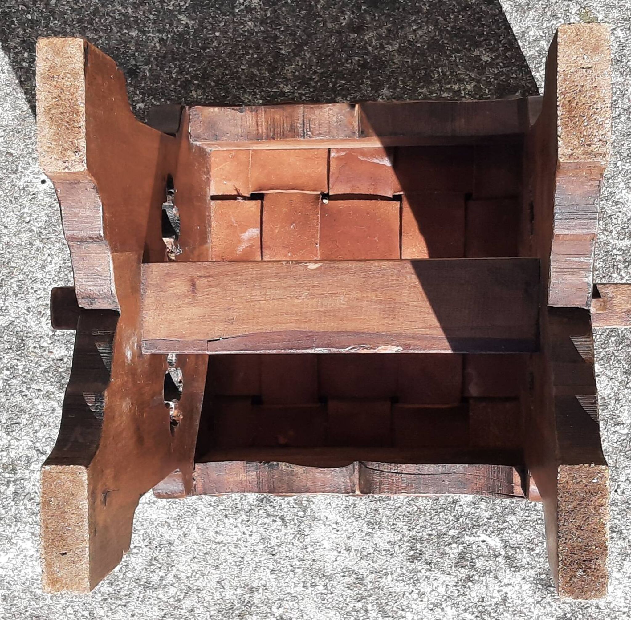 Pair of brutalist stools, leather seat.