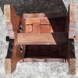 Pair of brutalist stools, leather seat.