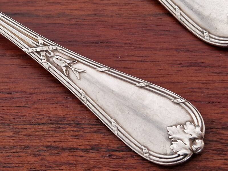 Christofle, Paris - Set of 2 table spoons - Crossed Ribbons model - in silver-plated metal