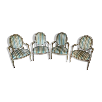 Set of four Louis XVI period armchairs