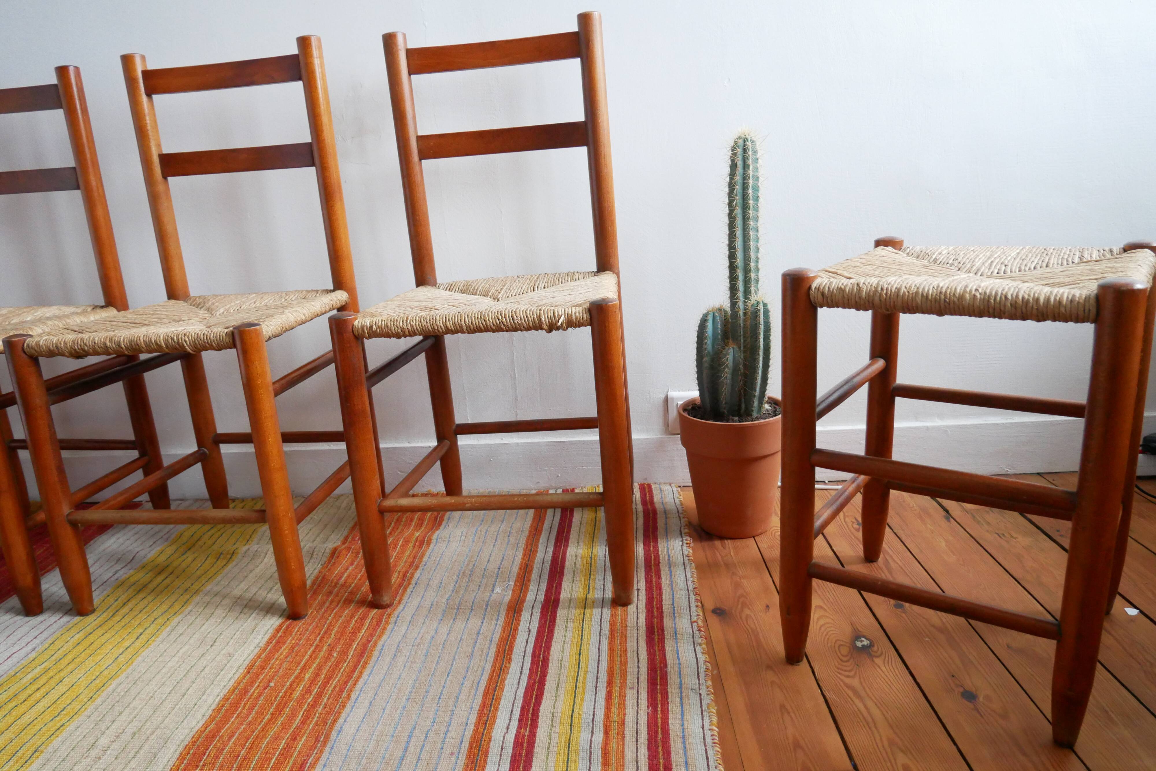 Set of 4 straw chairs and a stool