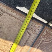 Vintage garden table with ceramic tile top and wrought iron base