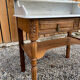 Wood and marble bathroom cabinet