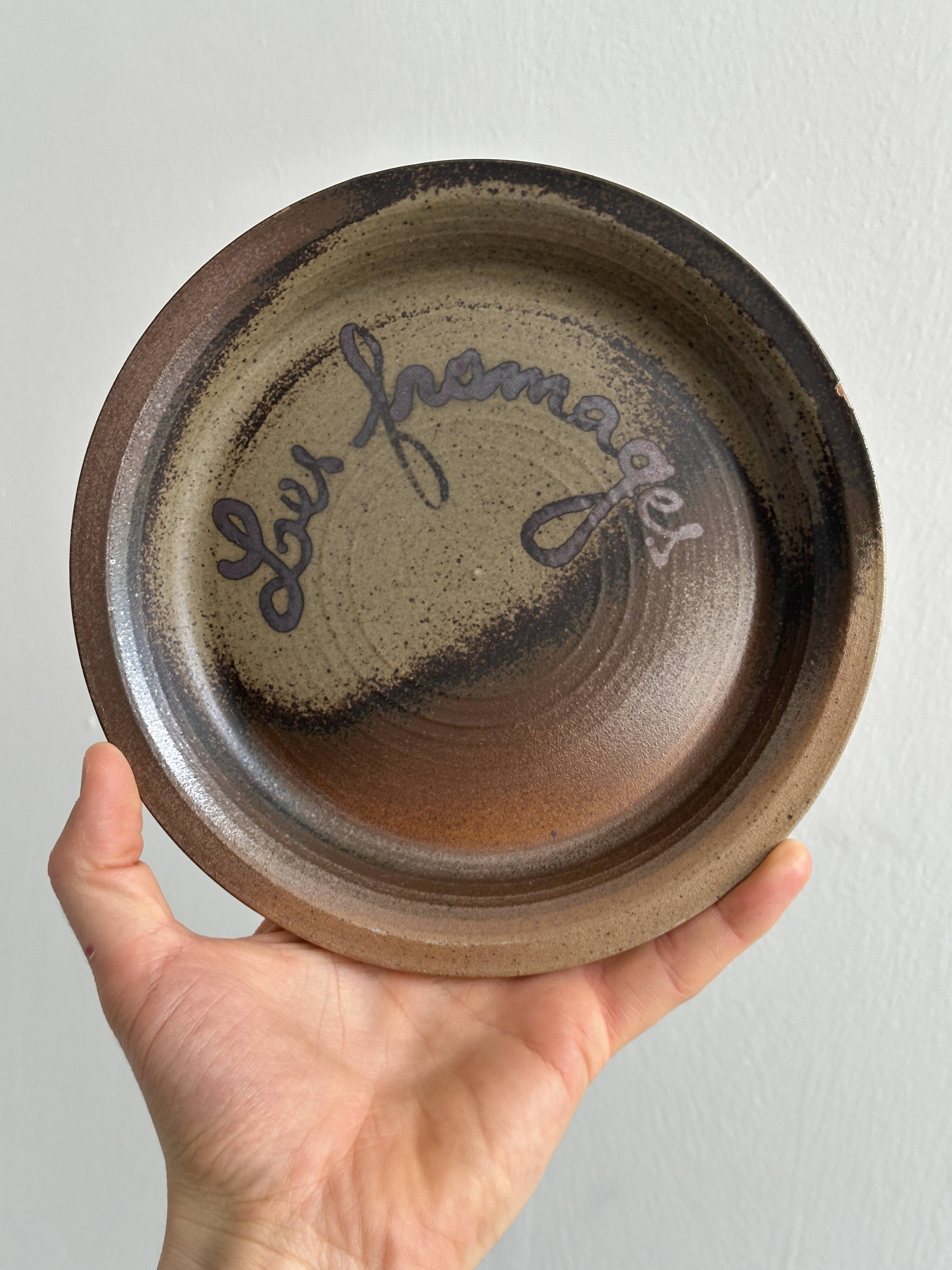 6 Arnon stoneware cheese plates.