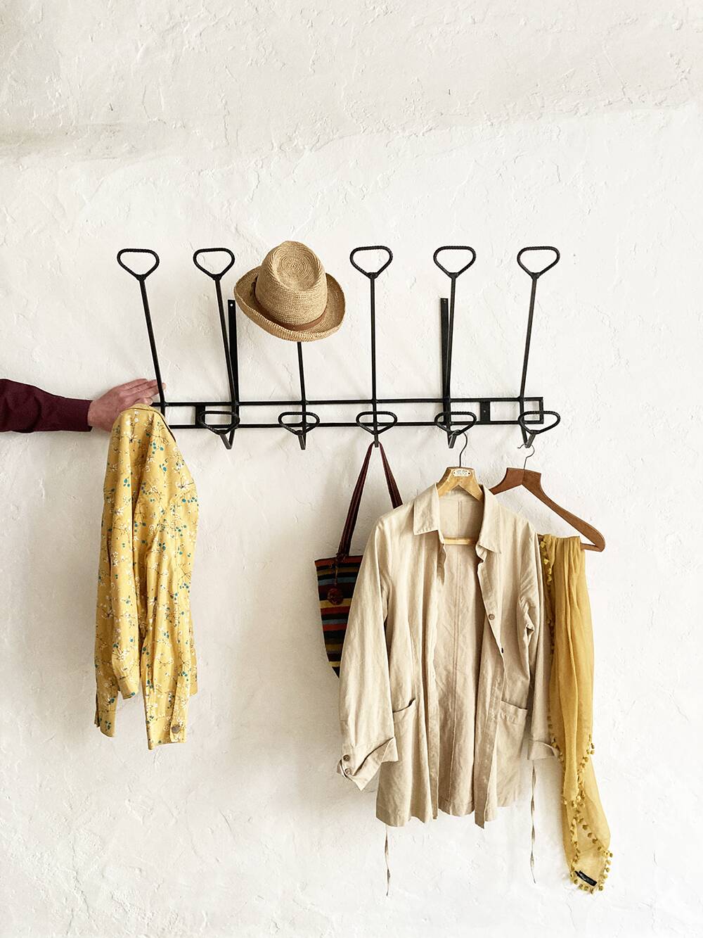 Wall-mounted coat rack with 12 hooks in handcrafted wrought iron