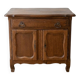 Rustic low cabinet in wood with herringbone marquetry.