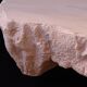 Design coffee table with travertine rock effect — unique piece hand-sculpted.
