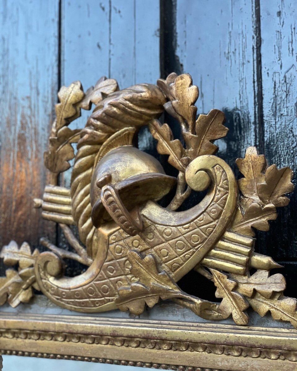 Louis XVI mirror in gilded carved wood, eighteenth century