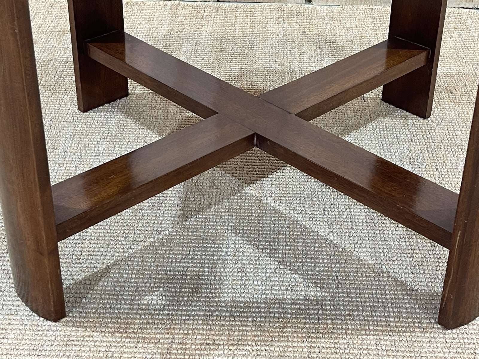 Art Deco side table in mahogany, fabric and glass.