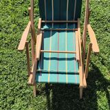 Vintage wooden and striped canvas deck chair – Retro style, chic country style