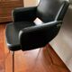 Black leatherette conference armchair