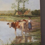 Oil on canvas depicting cows at the edge of the pond circa 1900