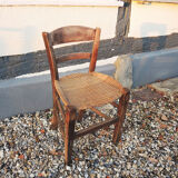 Ancienne chaise d’enfant en paille tressée