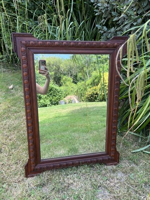 Antique carved wooden mirror