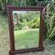 Antique carved wooden mirror