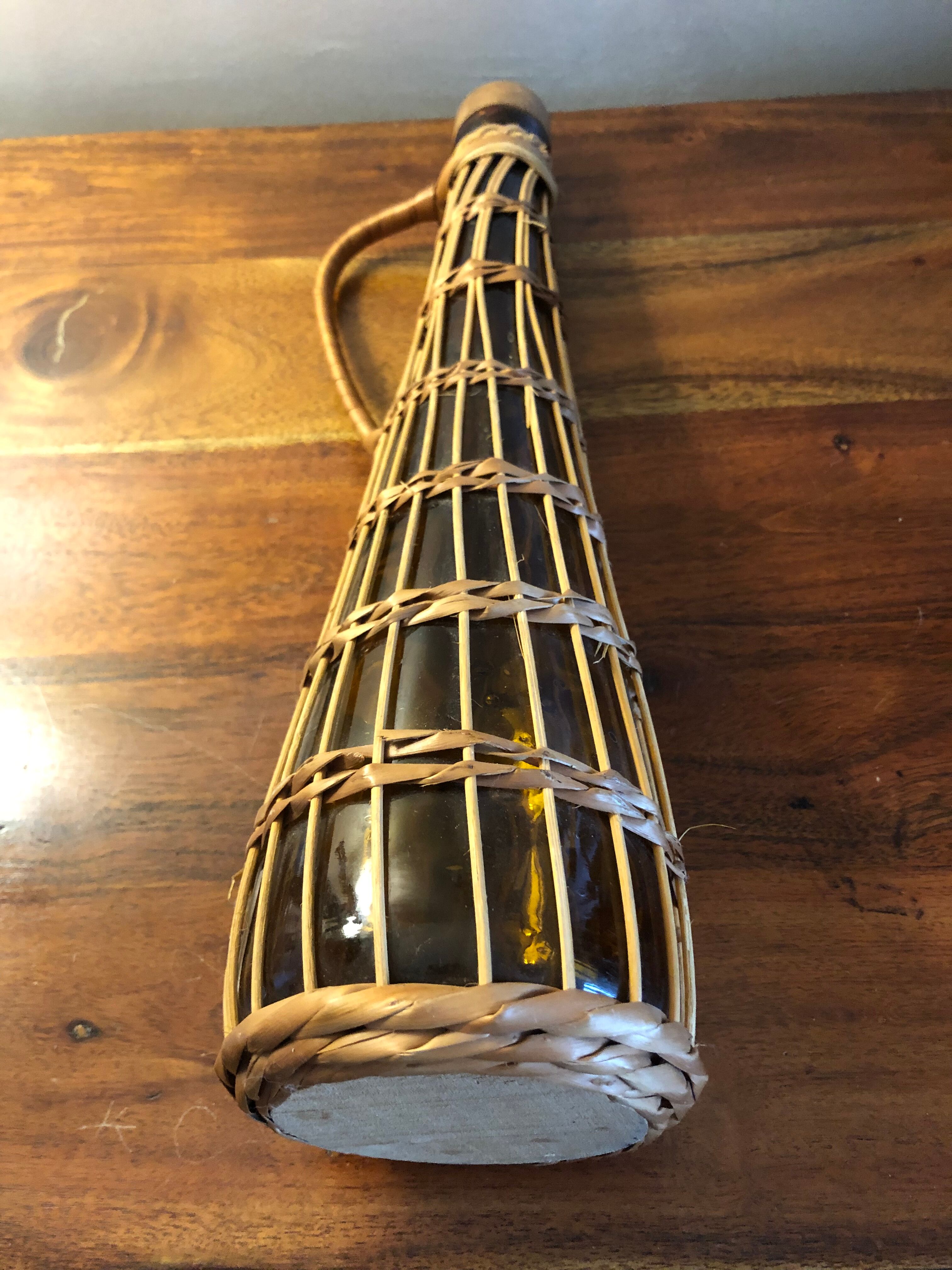 Amber and rattan glass carafe