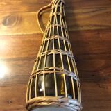 Carafe en verre ambré et rotin