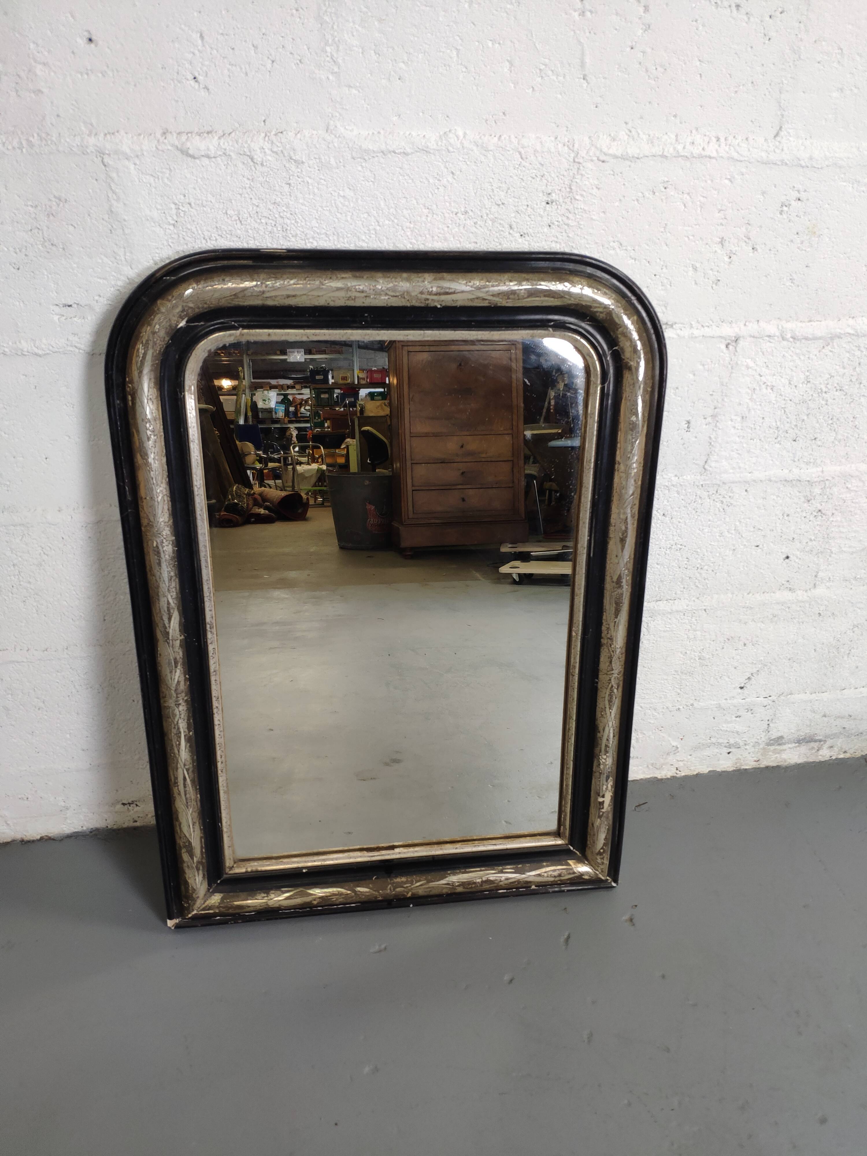 Mirror Louis-Philippe black wood and silver carved