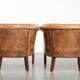 Set of two vintage sheepskin club armchairs with a beautiful light colour