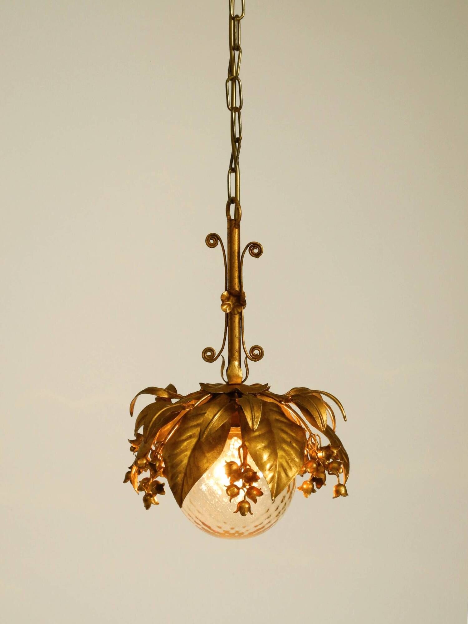 1970s gold-plated metal pendant lamp with a glass sphere by Hans Kögl
