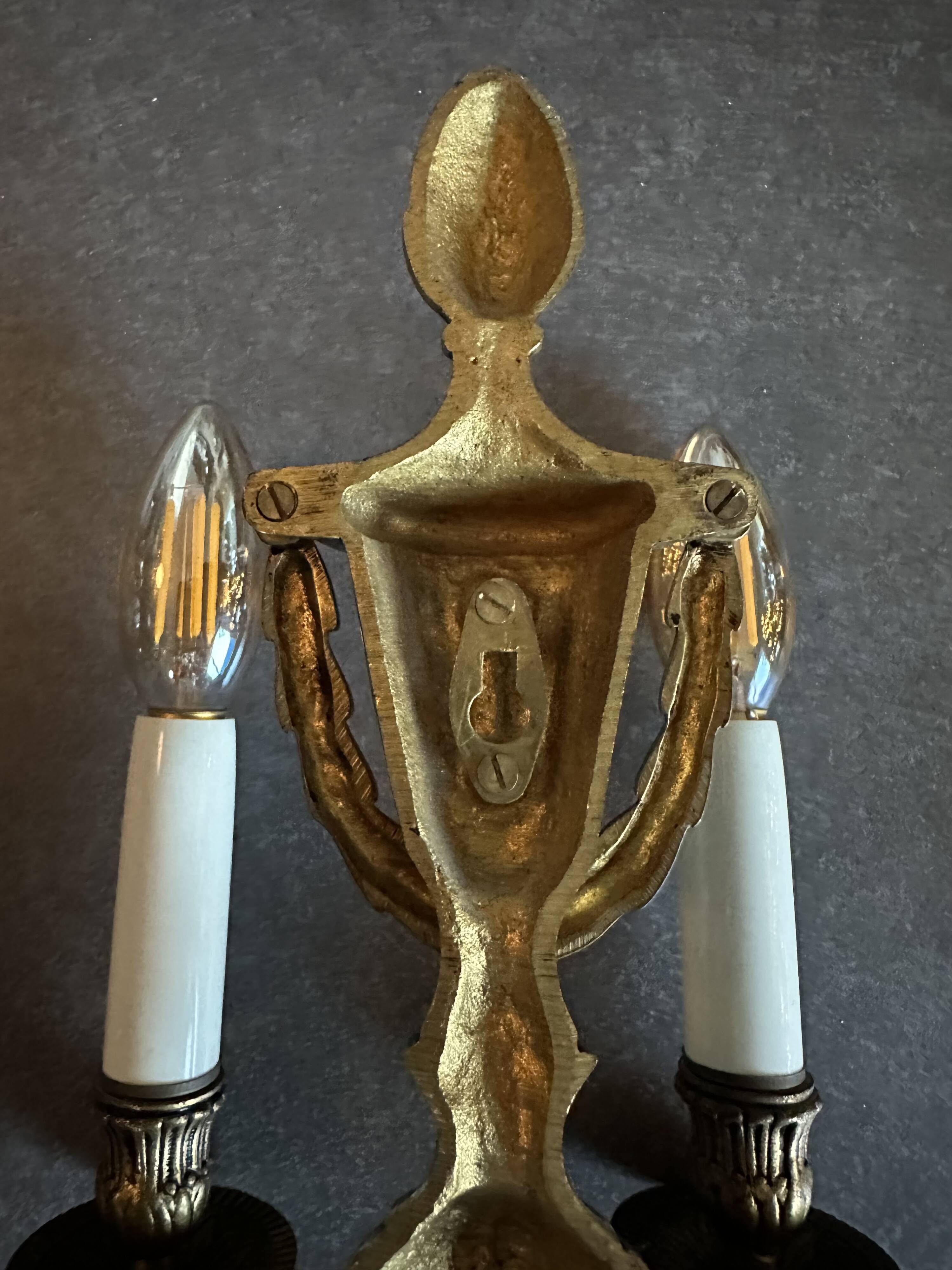 Pair of mid-19th century brass tassel sconces