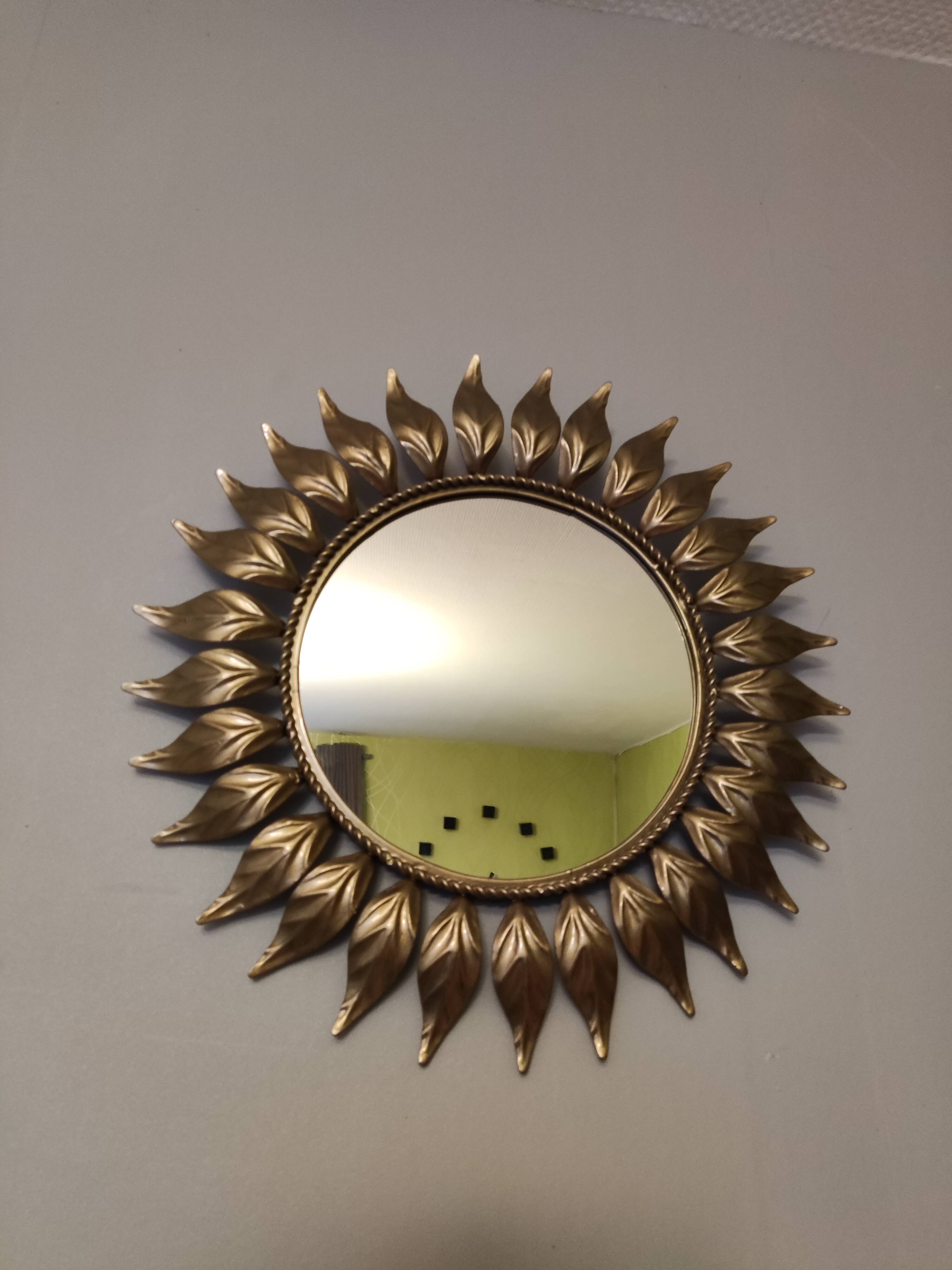 Miroir soleil en métal doré
