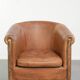 Vintage sheepskin club armchair in a beautiful light cognac colour